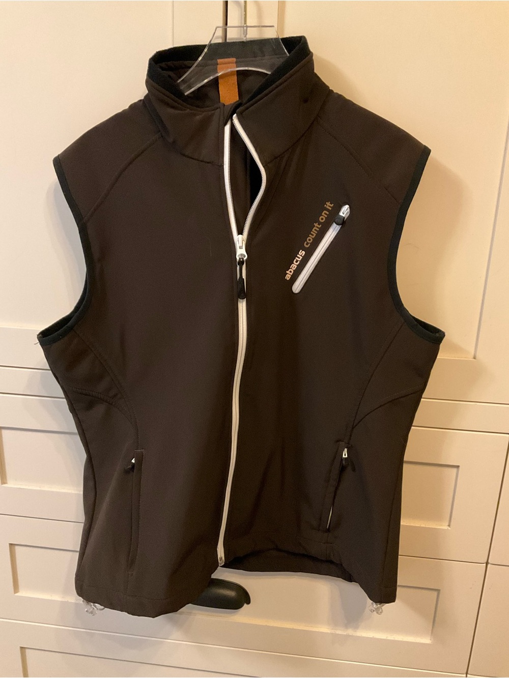 Abacus dark brown softshell zip vest with white trim